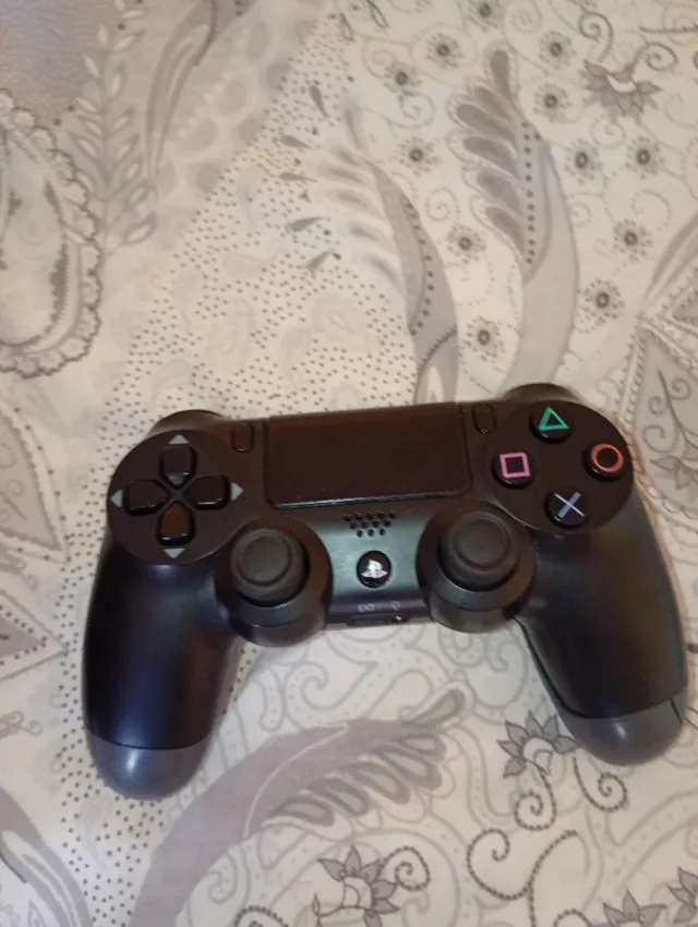 PS4 Slim 500GB + Mando Original.