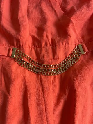 Mono corto Bebe naranja con cadena