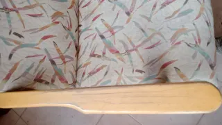 Sillón balancín tela y madera.