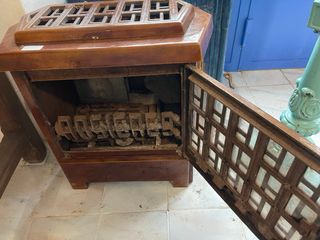 Estufa antigua hierro fundido marrón