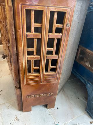 Estufa antigua hierro fundido marrón