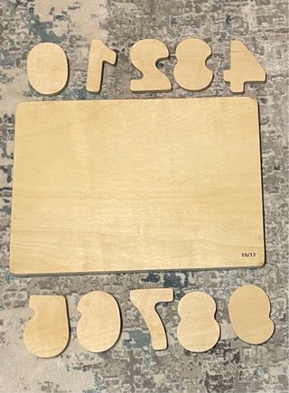 Puzzle de madera con números del 0 al 9