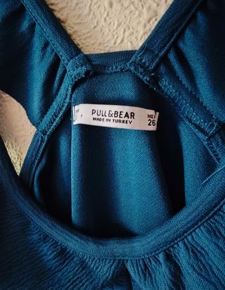 Mono corto con volantes y cordón