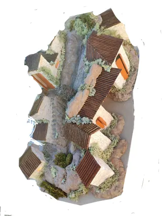 Belén casas con luz y río