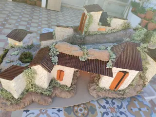 Belén casas con luz y río