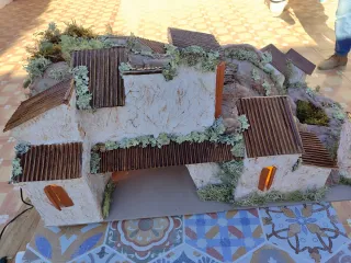 Belén casas con luz y río