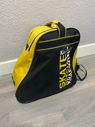 Patines en línea plateados y blancos