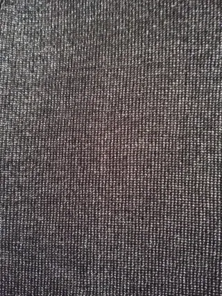 Camiseta plateada cuello alto sin mangas