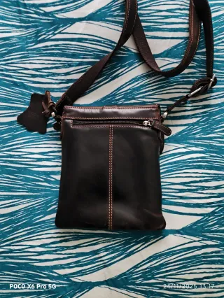 Bolso de piel marrón para hombre