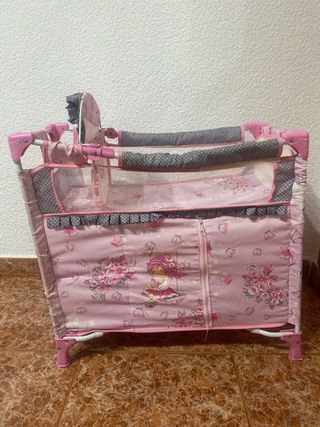 Cuna de viaje rosa para muñecas