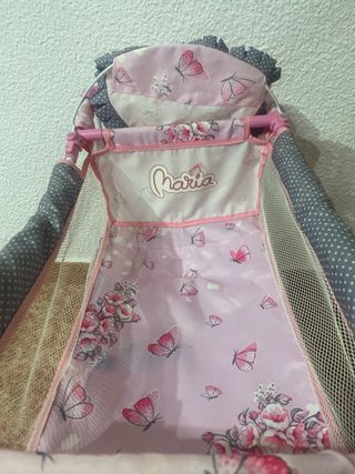 Cuna de viaje rosa para muñecas