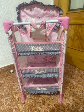 Cuna de viaje rosa para muñecas