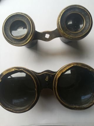 Prismáticos antiguos de bronce