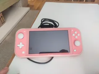 Nintendo Switch Lite Rosa con custodia e due giochi