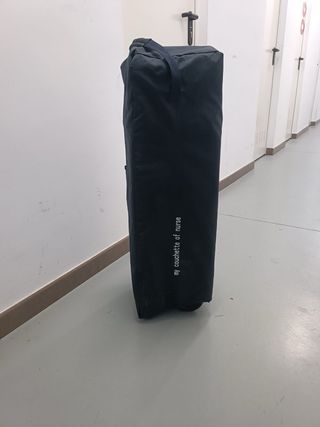 Cuna de viaje con diseño de patos