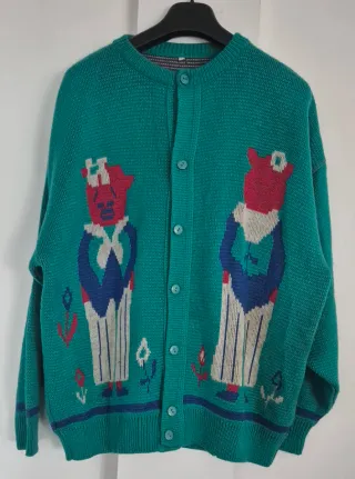 Chaqueta verde con estampado de figuras. Talla G