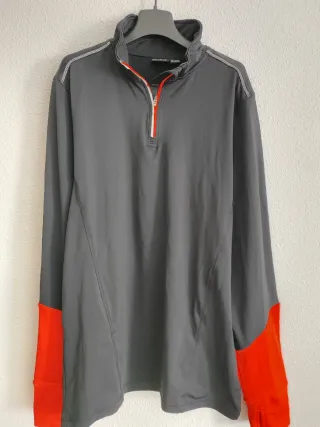 Jersey técnico gris y naranja