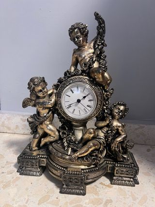 Reloj y candelabro bronce querubines