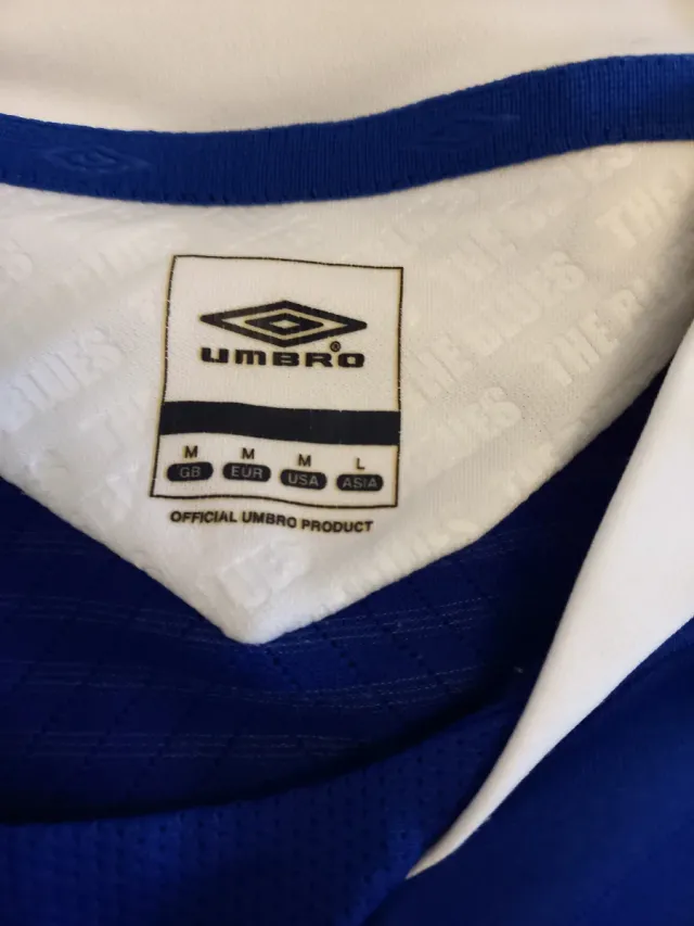 Maglietta da calcio blu Umbro...