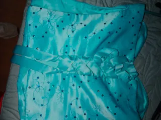 Conjunto Falda y corpiño color turquesa.