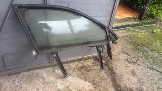 Marco con cristal Audi A4 B7 Dcha