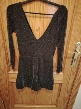 Mono brillante negro y plateado