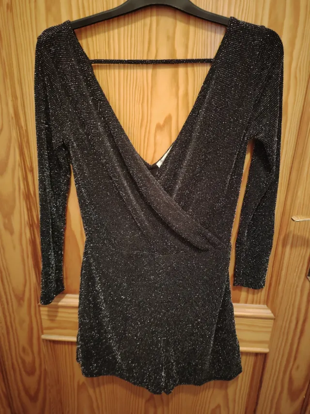 Mono brillante negro y plateado