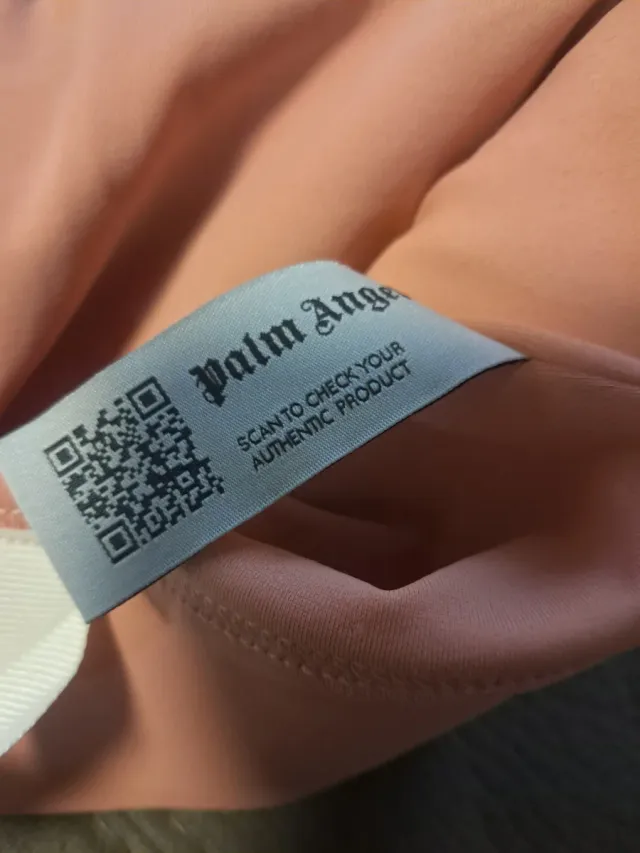 Top sportivo Palm Angels rosa e bianco