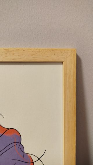 Cuadro mujer gafas corazón papel