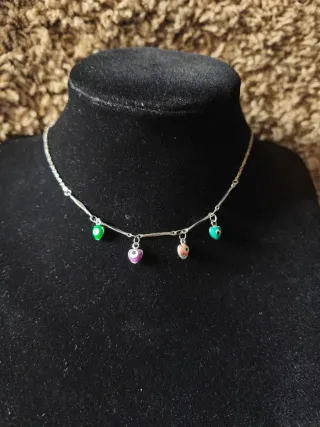 Colgante de acero con corazones