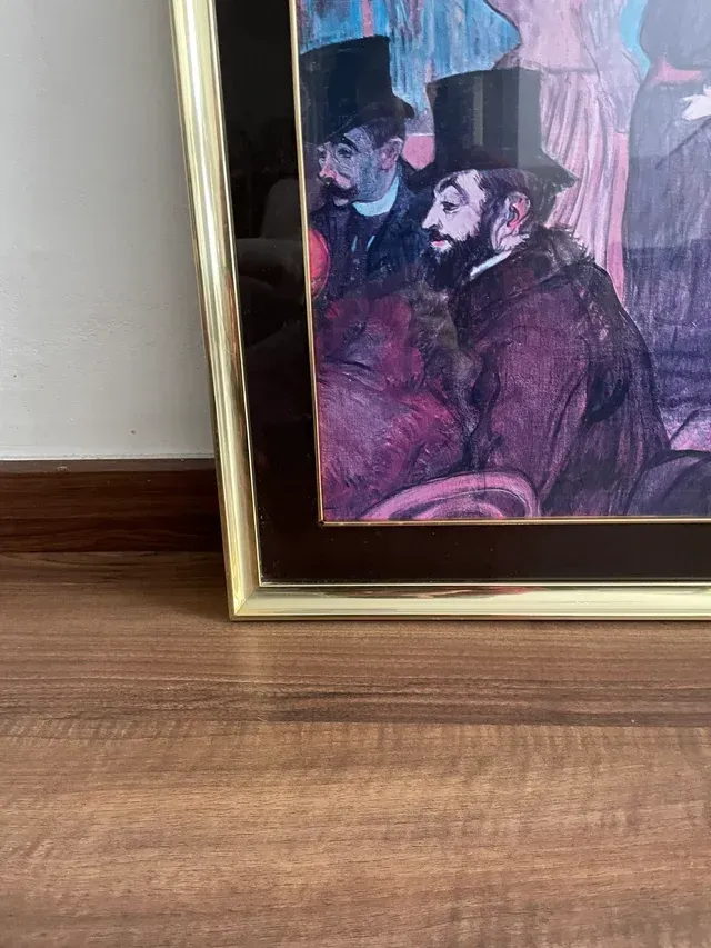 Quadro con cornice in metallo dorato