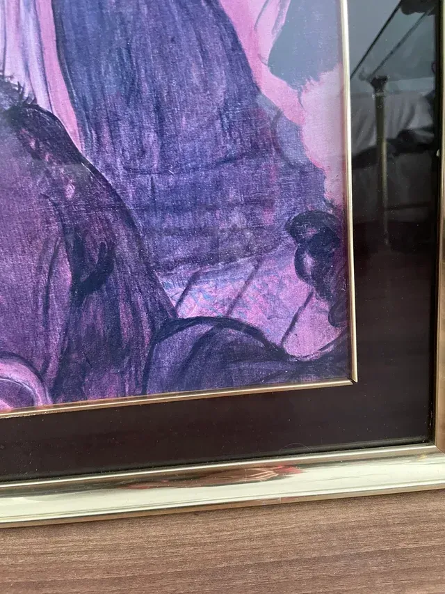 Quadro con cornice in metallo dorato