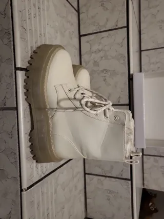 Anfibi donna bianchi con suola alta