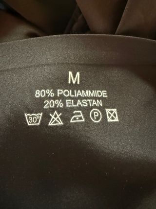 Pantaloni a zampa effetto slim shaping snellenti