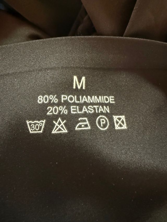 Pantaloni a zampa effetto slim shaping snellenti