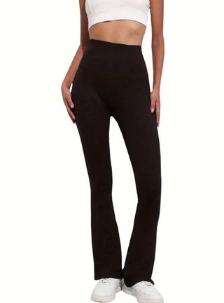 Pantaloni a zampa effetto slim shaping snellenti