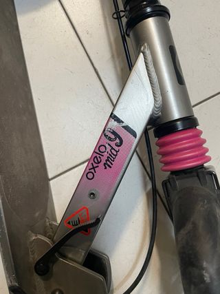 Patinete Oxelo rosa y negro mid 9