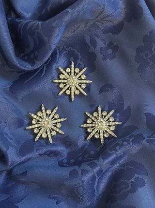 Conjunto 3 broches estrella plateados