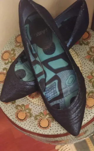 Zapatos planos azules con estampado interior