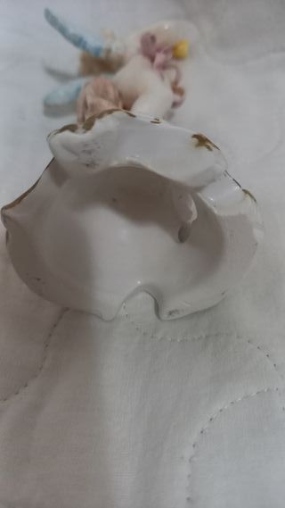 Statuina angioletto con corno in ceramica