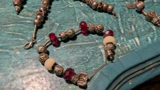 Set bracciali in metallo con ciondoli simil pandor