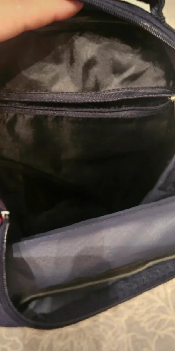 Zaino a tracolla blu marino con logo Winston