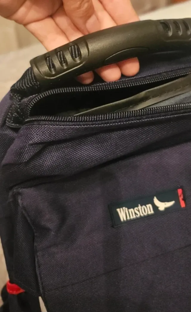 Zaino a tracolla blu marino con logo Winston