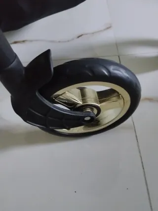 Cochecito de muñecas rosa