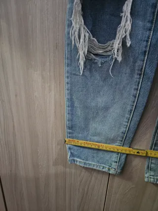 Salopette in denim strappata donna