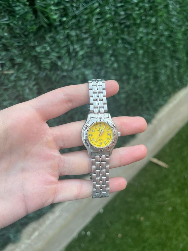 Reloj Calypso Daydate Amarillo y Plateado