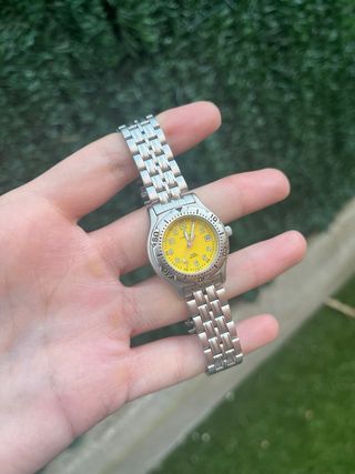 Reloj Calypso Daydate Amarillo y Plateado