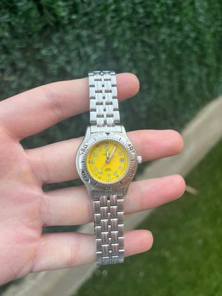 Reloj Calypso Daydate Amarillo y Plateado