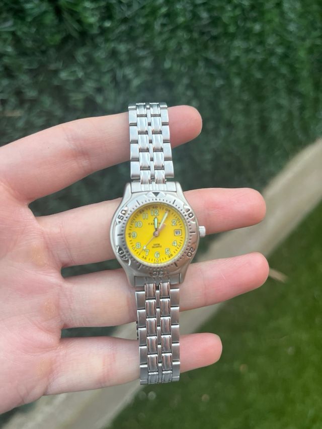Reloj Calypso Daydate Amarillo y Plateado