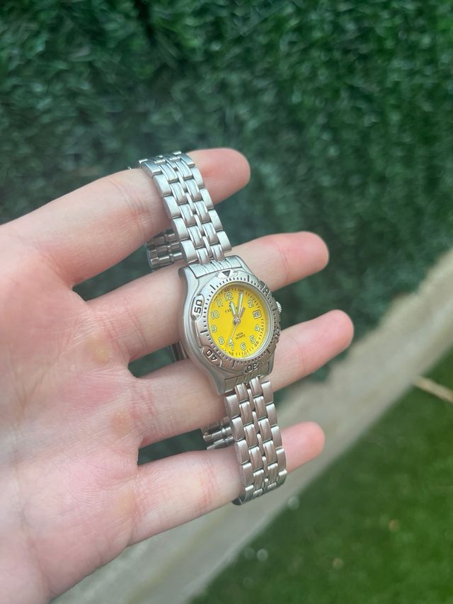 Reloj Calypso Daydate Amarillo y Plateado